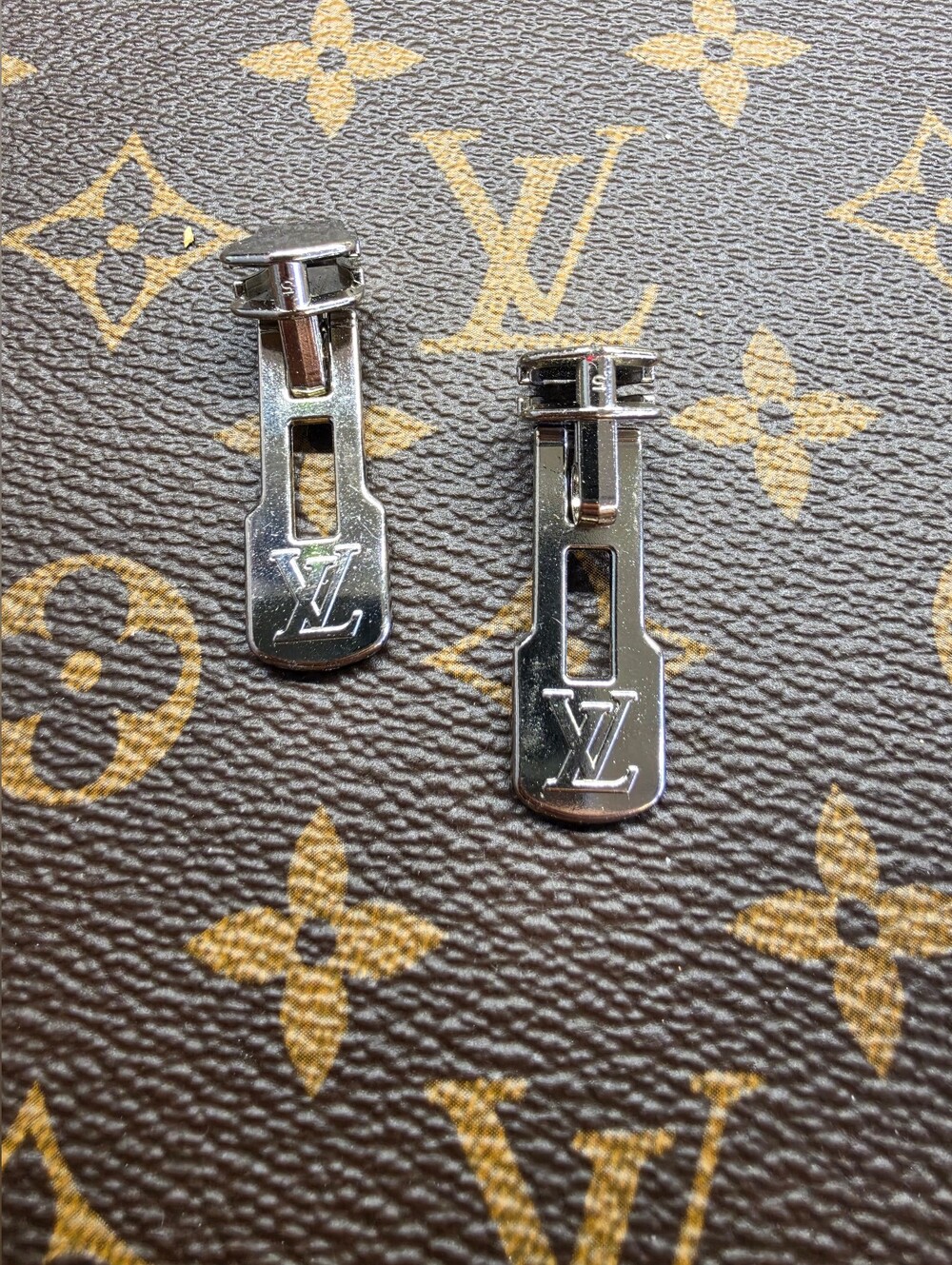 Louis Vuitton Silver LV Zipper Pulls Pair